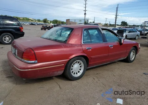 2000 Ford Crown Victoria Lx z USA, uszkodzony, nr VIN 2FAFP74W4YX100974